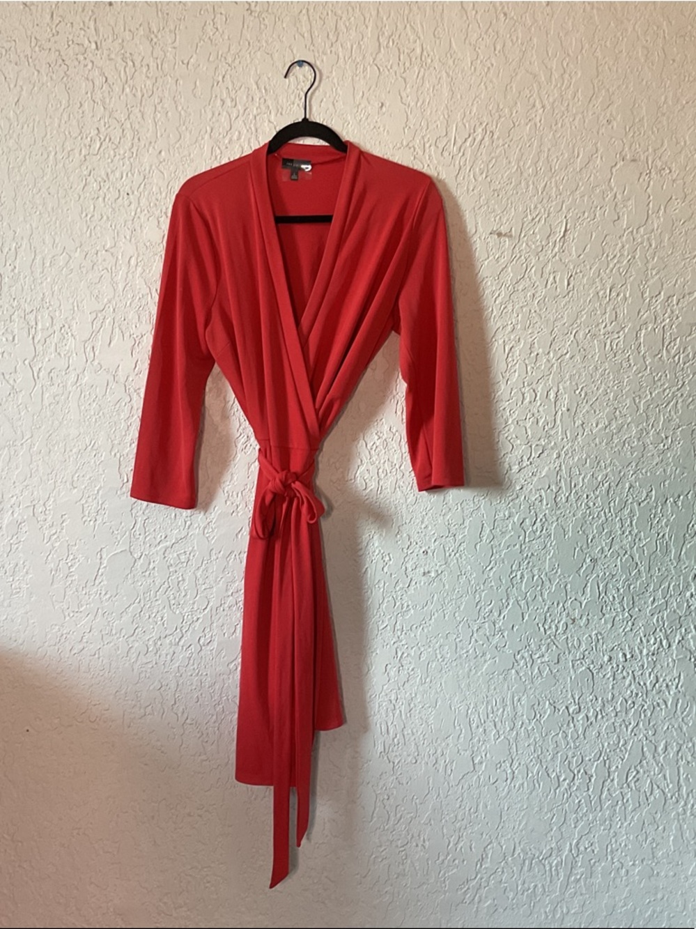 Peach wrap dress with tie at waist. Limited.
